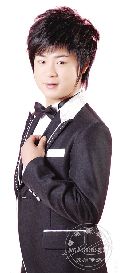 访"相约越乡"越剧票友擂台赛总决赛冠军王春锋